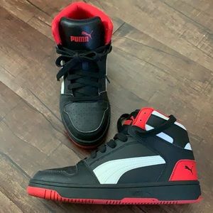 Black red and white Puma high top basketball shoe
